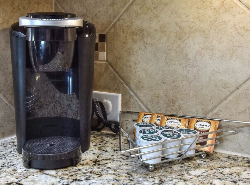 Single cup Keurig w/ 6 coffee pods and t-bags to get you started…