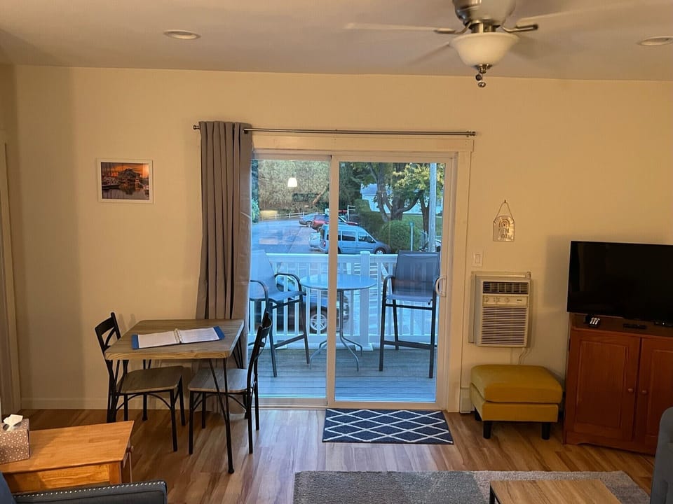 Bistro table with plenty of room for meals, and slider out to private deck