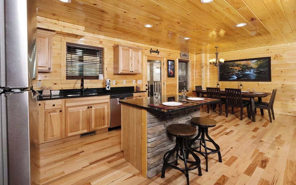Fully-Equipped Kitchen with Island and Bar Stools