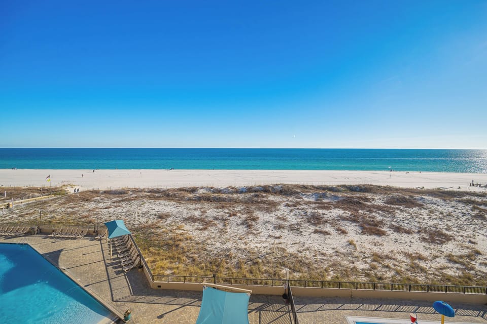 Gentle waves sparkle as you enjoy the coastal breeze and watch the distant horizon stretch wide