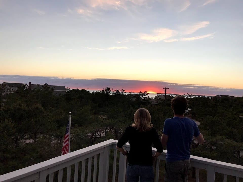 Sunset view of Cape Cod Bay from the primary bedroom balcony