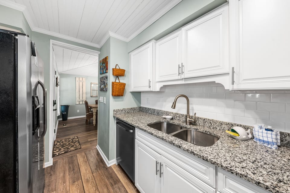 Great galley kitchen with stainless steel appliances for any gourmet chef