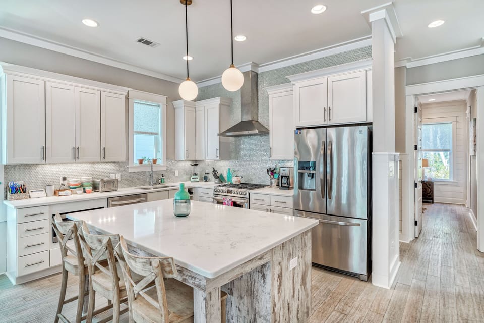 Your dream kitchen awaits with gleaming countertops, top-tier appliances, and a welcoming island perfect for morning coffee or evening wine.