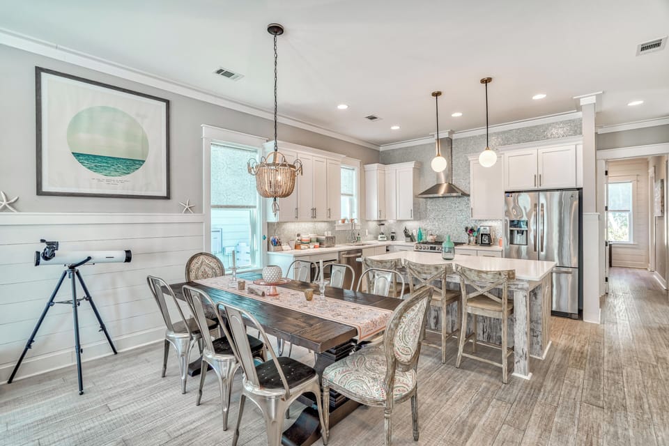 Your coastal-themed kitchen flows seamlessly into the dining area.