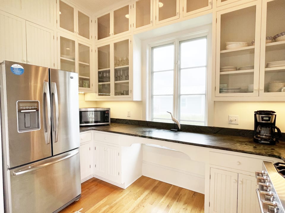 KITCHEN W/STAINLESS STEEL APPLIANCES; LARGE DOUBLE DOOR FRIDGE