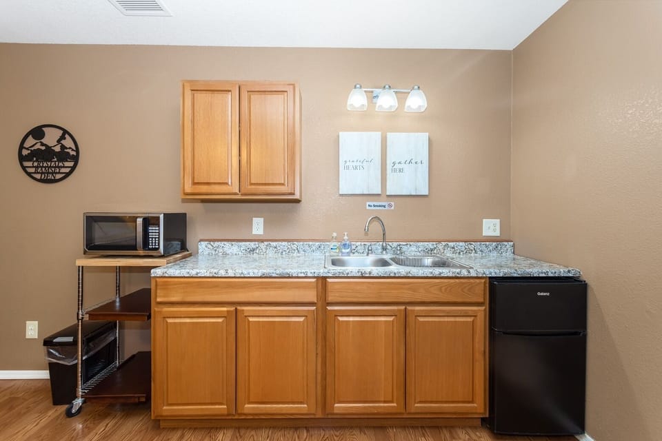 Kitchenette located in bedroom one. Hot plates, pots and pans, dishes & utensils