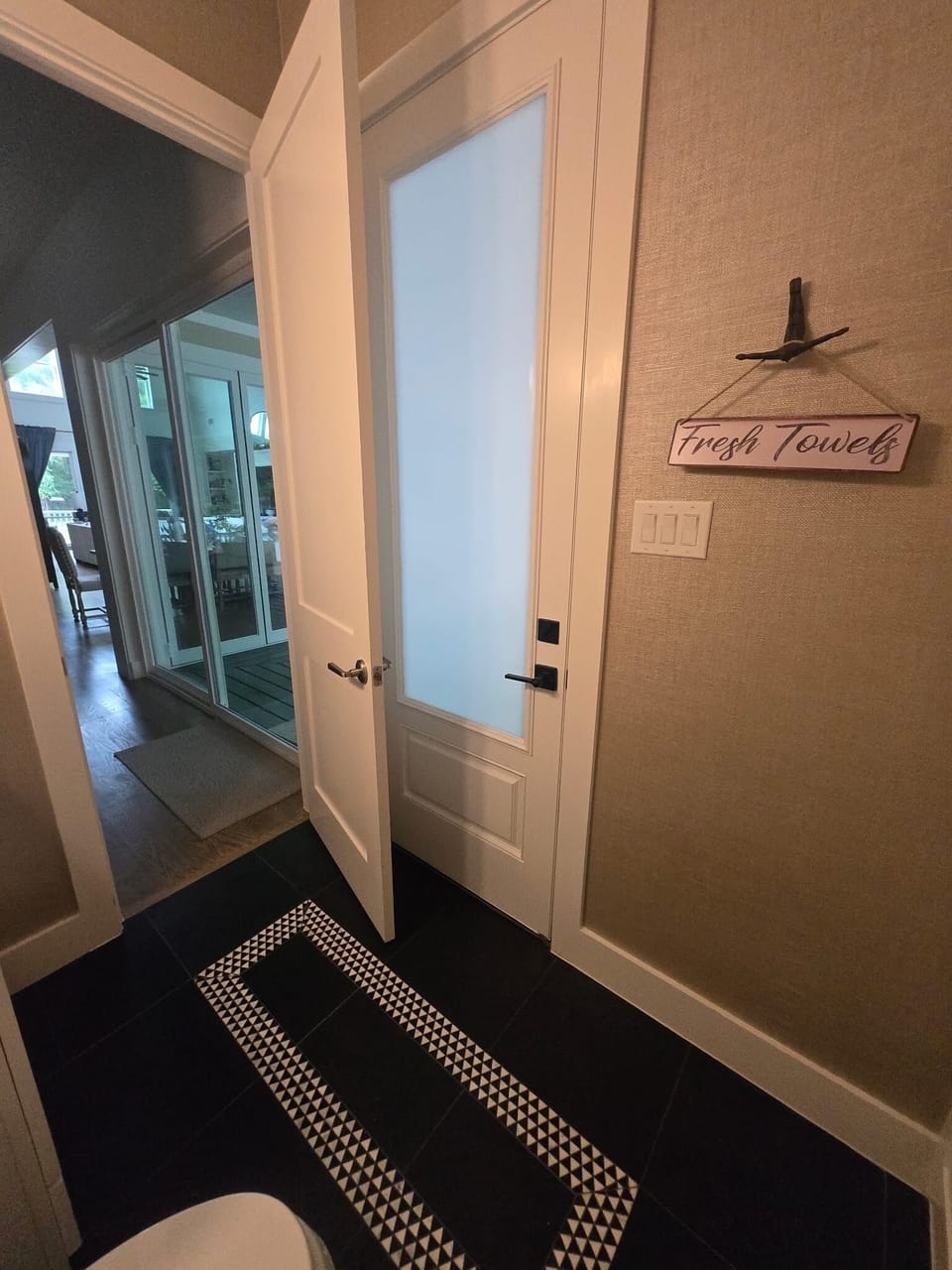 Door to pool in downstairs half bath