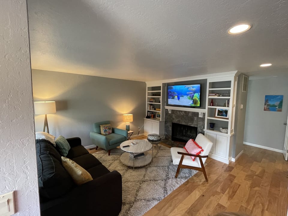 Smart TV ready for your streaming service, working fireplace, Queen sofa bed.