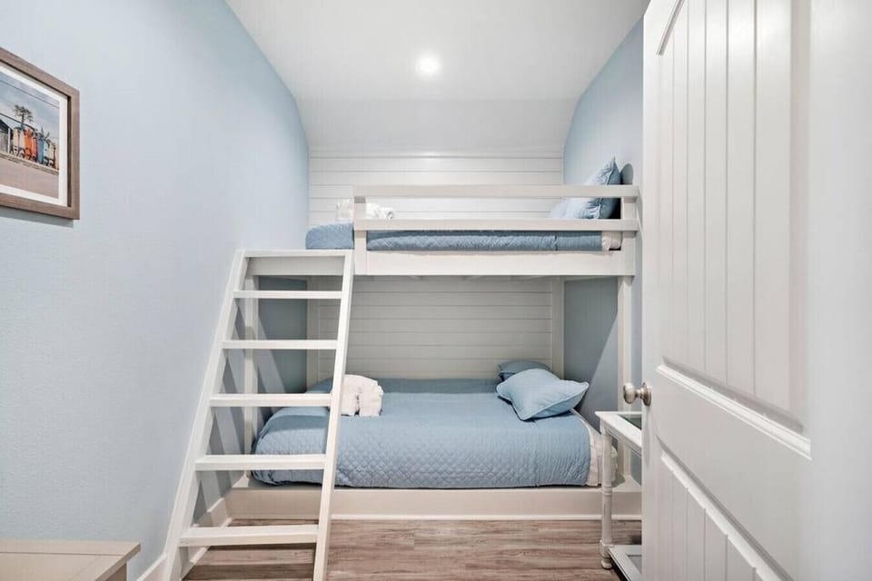 This bedroom has a double over queen bunk bed