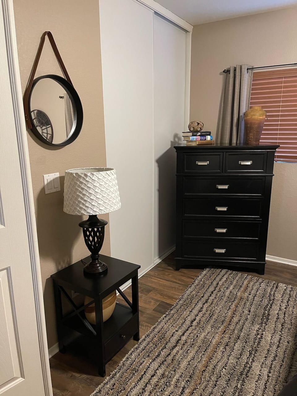 Additional nightstand, lamp, and chest in the middle bedroom. (Guest room #1)