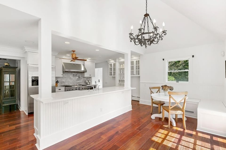 Kitchen now has full size dining table to seat 6 + 4 bar stools + the table seen
