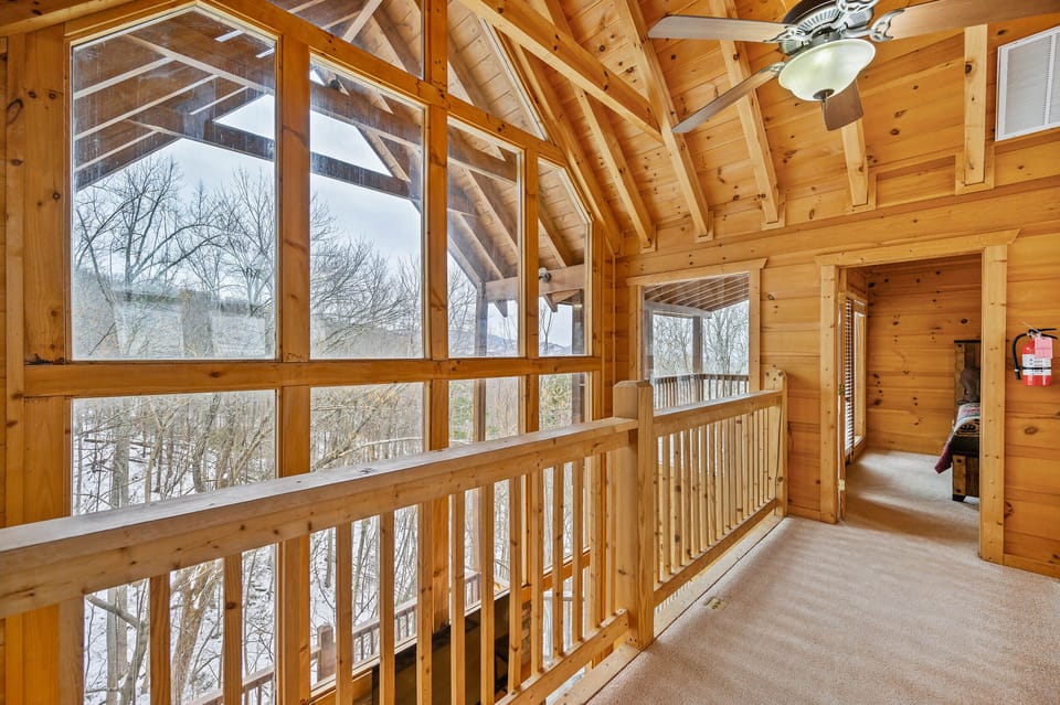 Unique bridge connects the two bedrooms on the upper floor