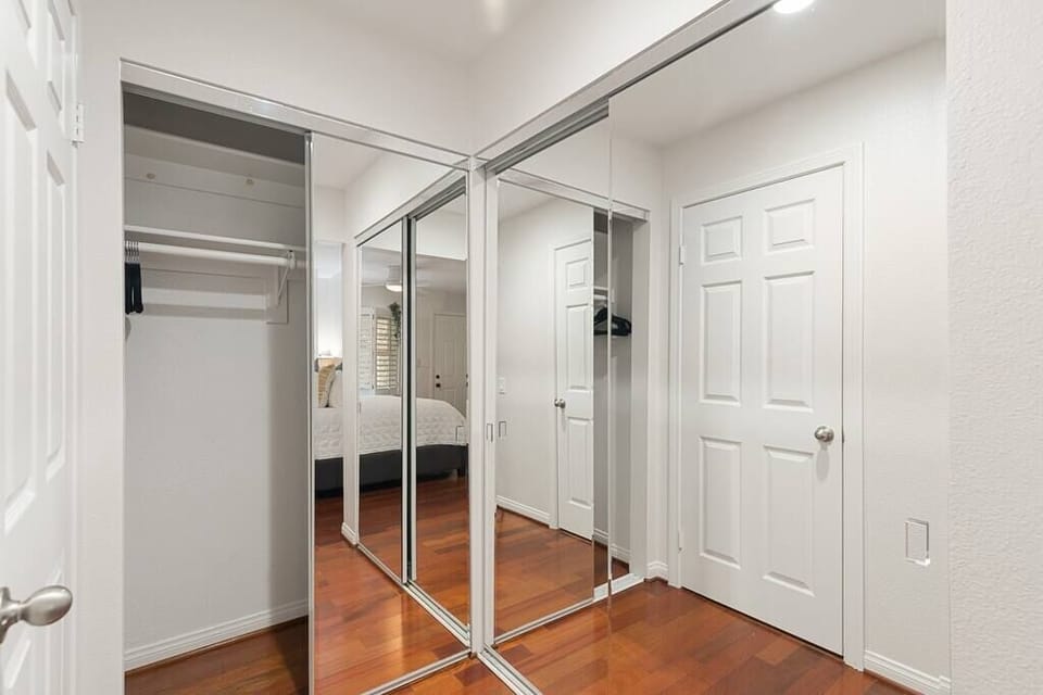 The mirrored closet comes in handy for picking the perfect outfit for the night!