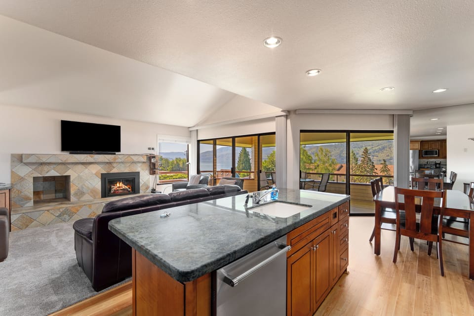 Open Floor Plan: Kitchen, Dining, Living Room all leads to lake view deck