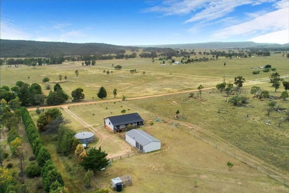 Set among sprawling green and fenced grounds.