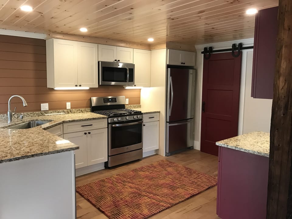 Open Concept Kitchen, fully equipped, bar area, stainless appliances