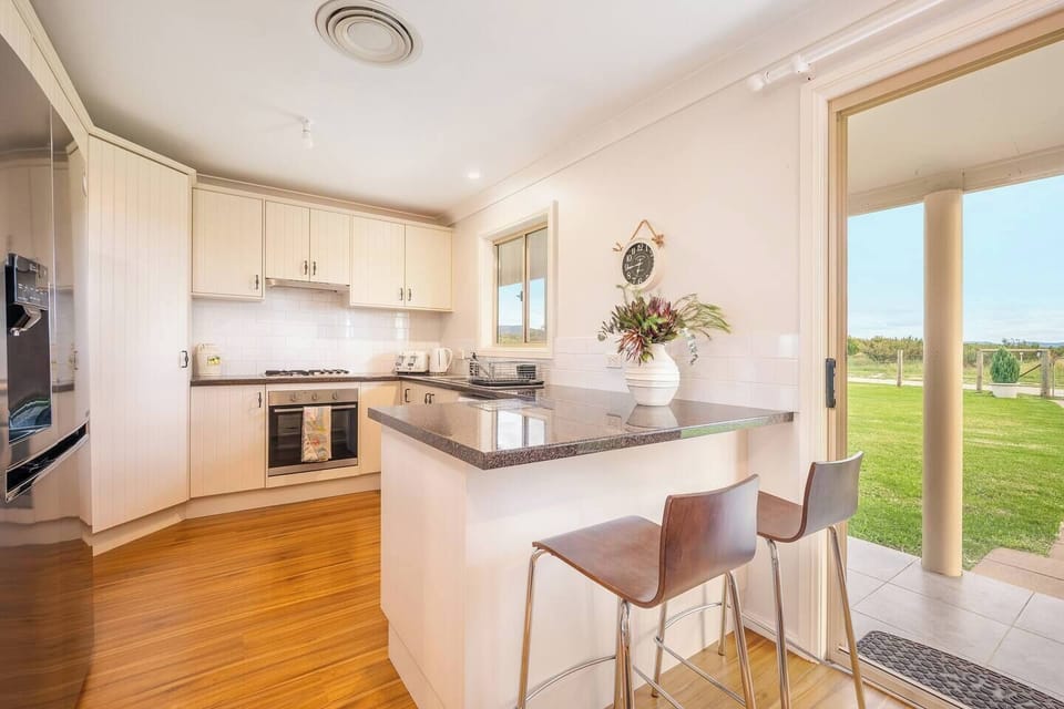 The kitchen is fully-equipped with everything you'll need to cook up a meal at home. 