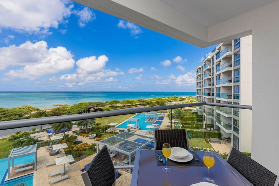 Balcony w/ Dining Table and Chairs