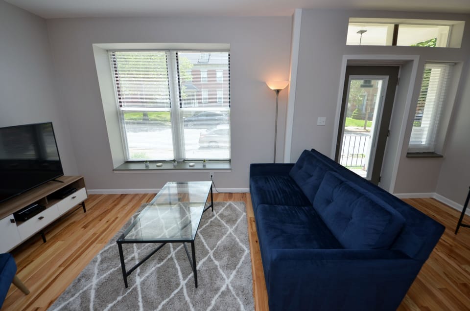 Living Room With 55" 4K Smart TV, Cable And DVD Player