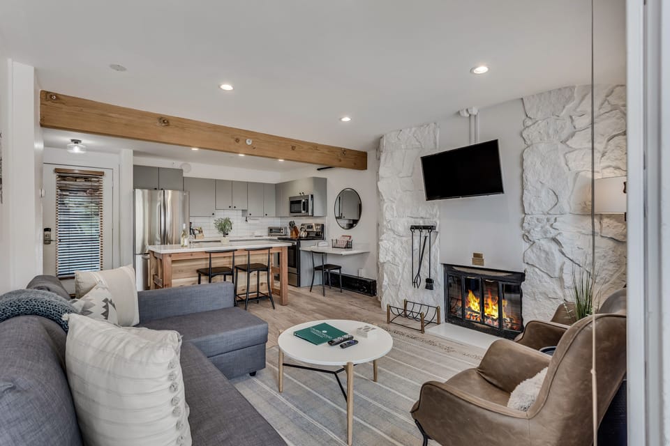 Living room with wood-burning fireplace