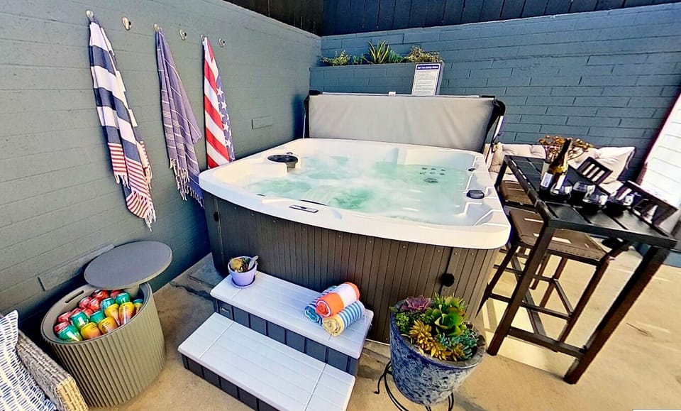 6-person hot tub with 90 massage jets, and waterfall feature