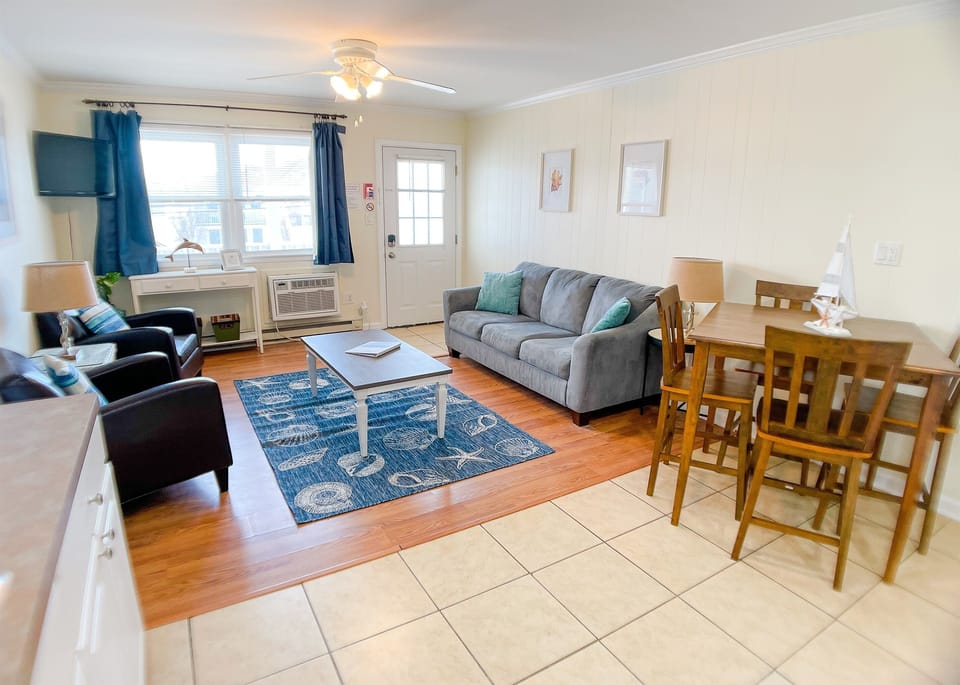 Living and dining room with plenty of seating.