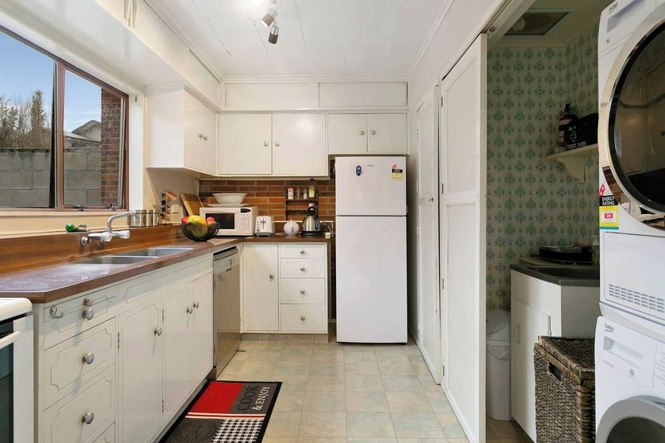 Kitchen & laundry area with all you need for a little holiday