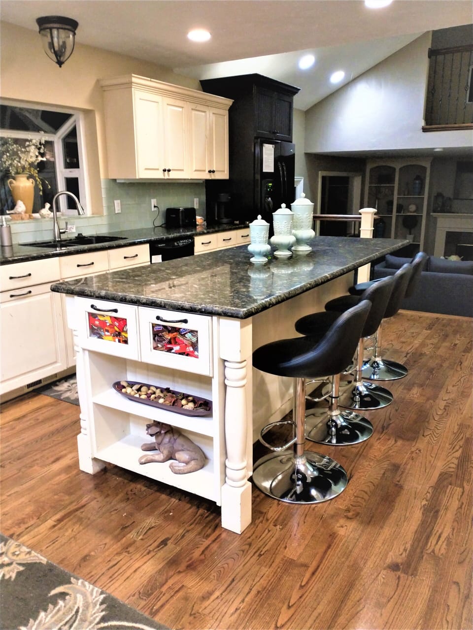 4 barstools at lg island makes seating for 12. Don't overlook the candy drawers