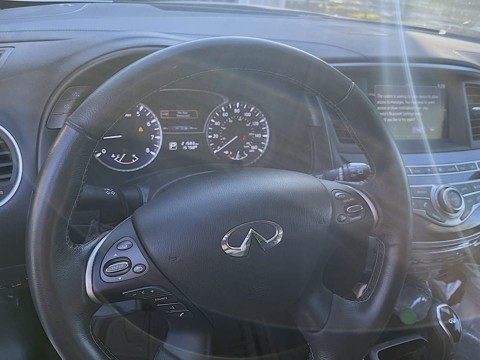 Travel in Comfort and Style with our Reliable Car Rental • Infiniti QX60 LUXE • 