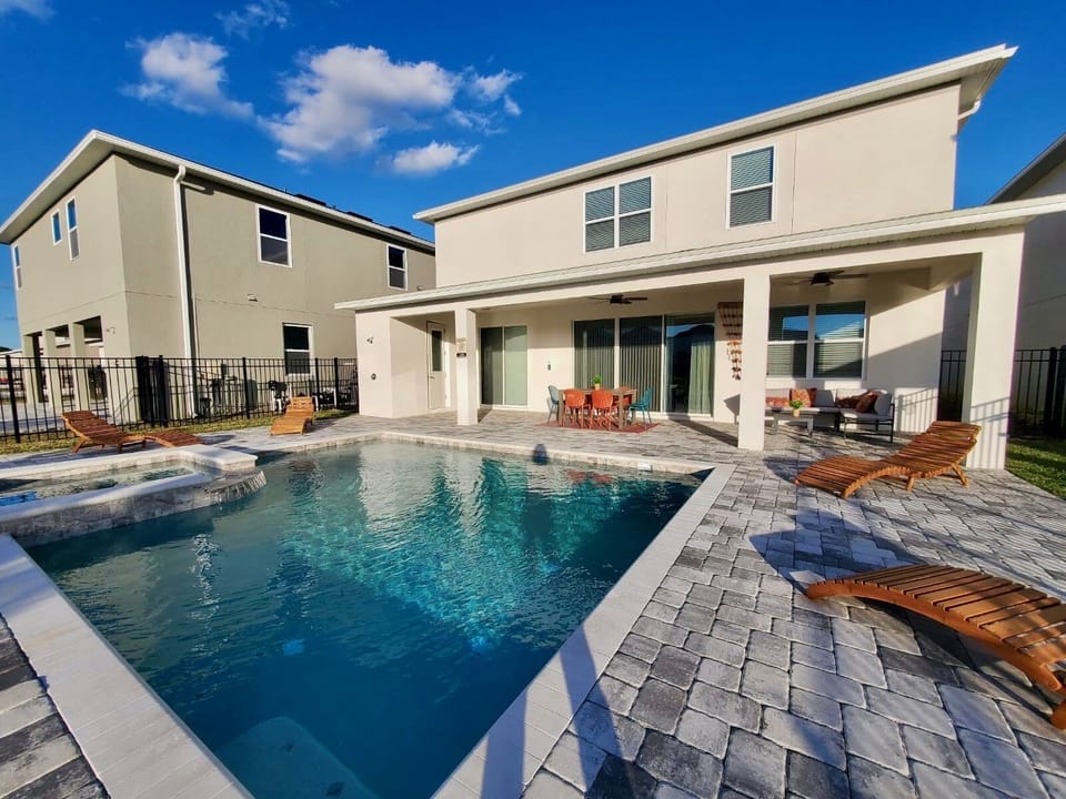 Enjoy the Florida weather in the private pool, or get into our spill-over spa