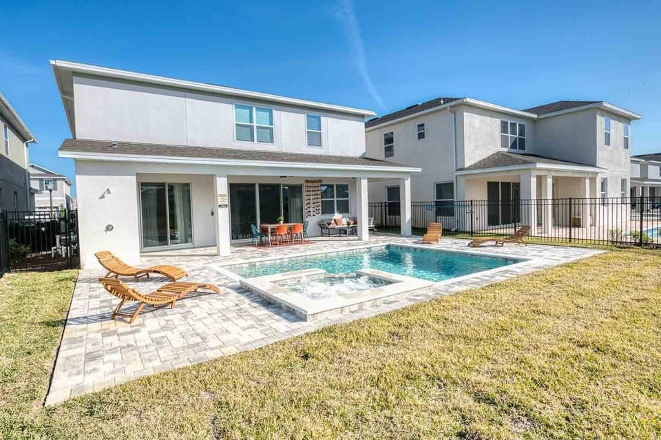 Enjoy the Florida weather in the private pool, or get into our spill-over spa