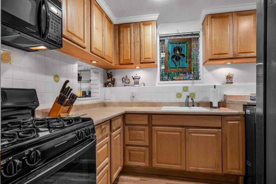 Our Kitchen comes with a full size refrigerator, stove/oven, microwave and washer dryer plus all the Kitchen essentials