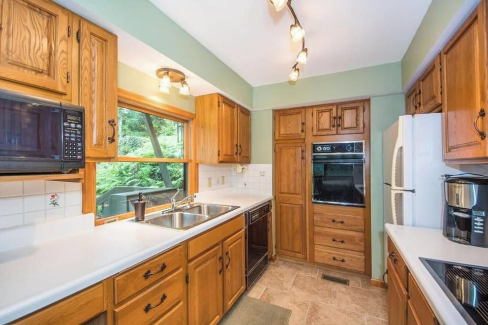 Fully stocked kitchen; microwave, oven, stove, dishwasher, 2 crockpots.