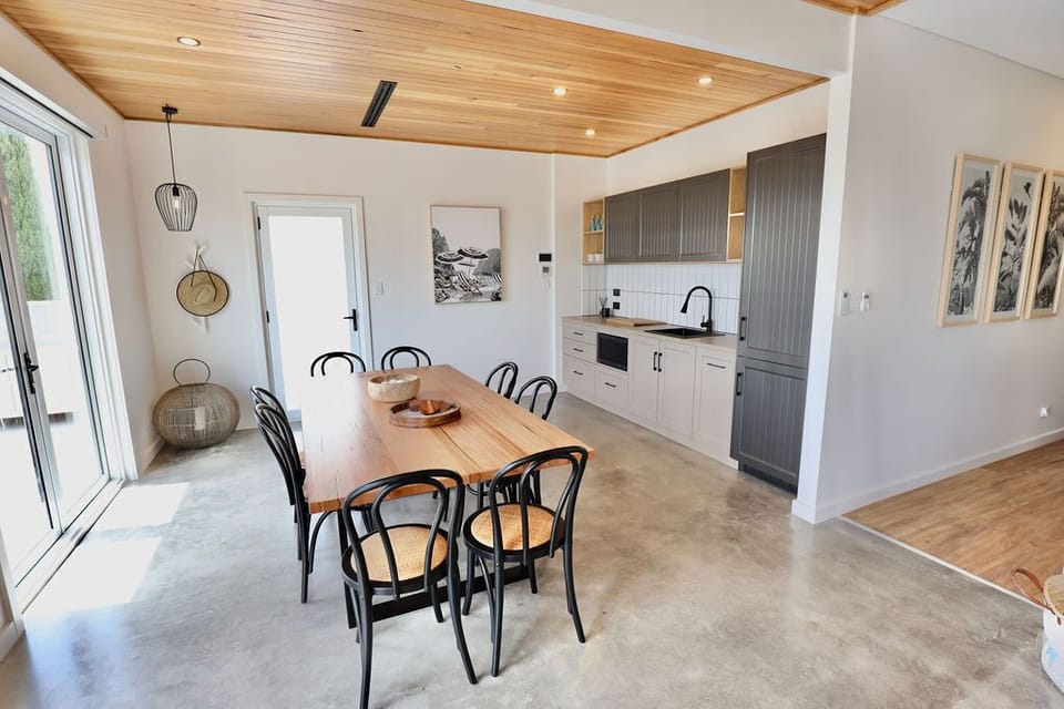 Dining through to outdoors and bedrooms
