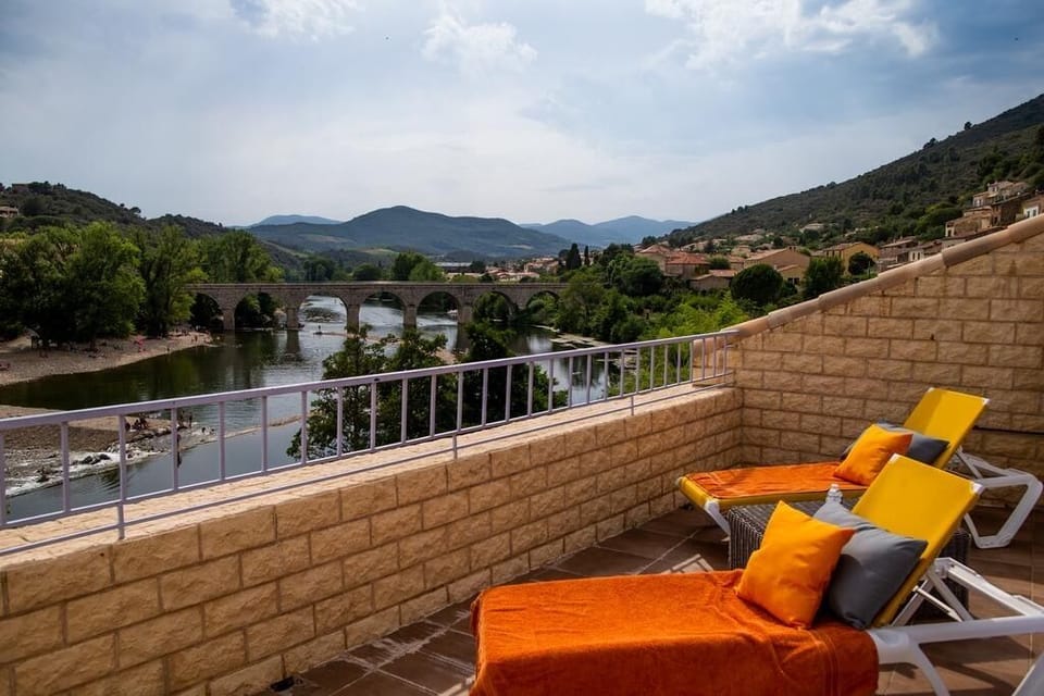 Terrace off top bedroom with fantastic views of the river orb and the mountains