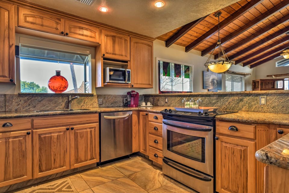 Kitchen area with stainless steel appliances 
