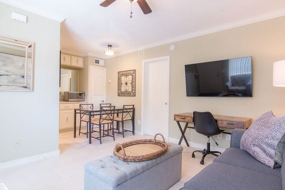 Underneath the TV is a laptop workstation.  Connect all your devices to lightening fast Xfinity WiFi with speeds up to 1200mbps.
