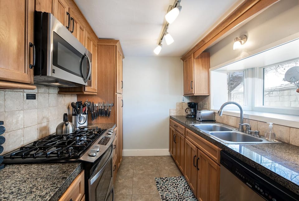 Galley style kitchen for when you don't want to walk the block and a half to the downtown restaurant scene.