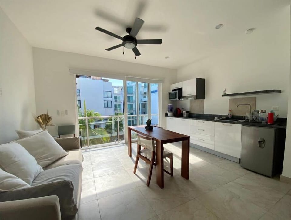 Balcony, microwave, fridge , stove utensils. Water filter, Nespresso & more