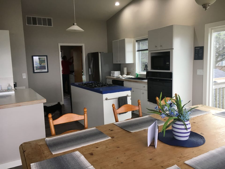 Open kitchen plan tied to dining and,living room.