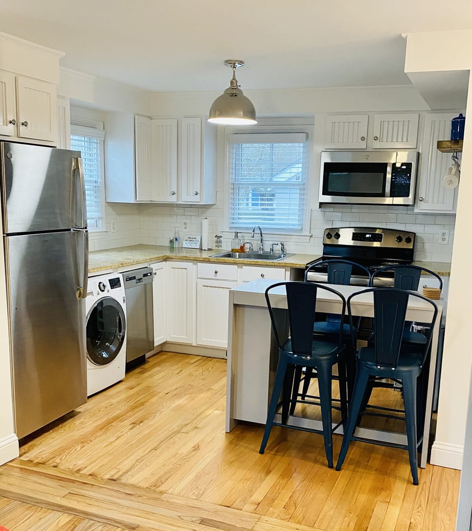 Open eat in kitchen area- view from living space