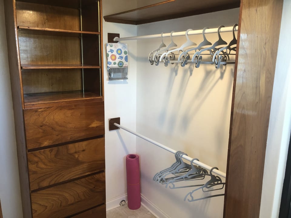 Closet also includes a queen air mattress, yoga mat, safety gate & hangers