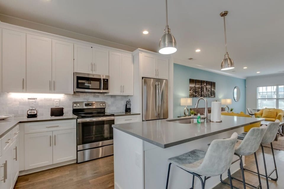Modern kitchen with stainless steel appliances