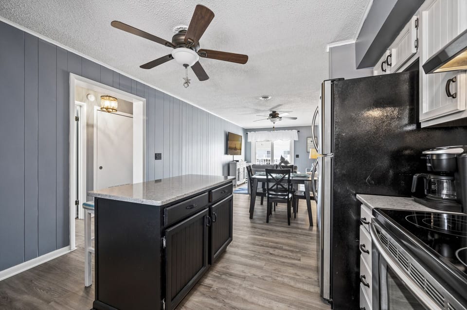 Gleaming Granite Countertops and Center Island.