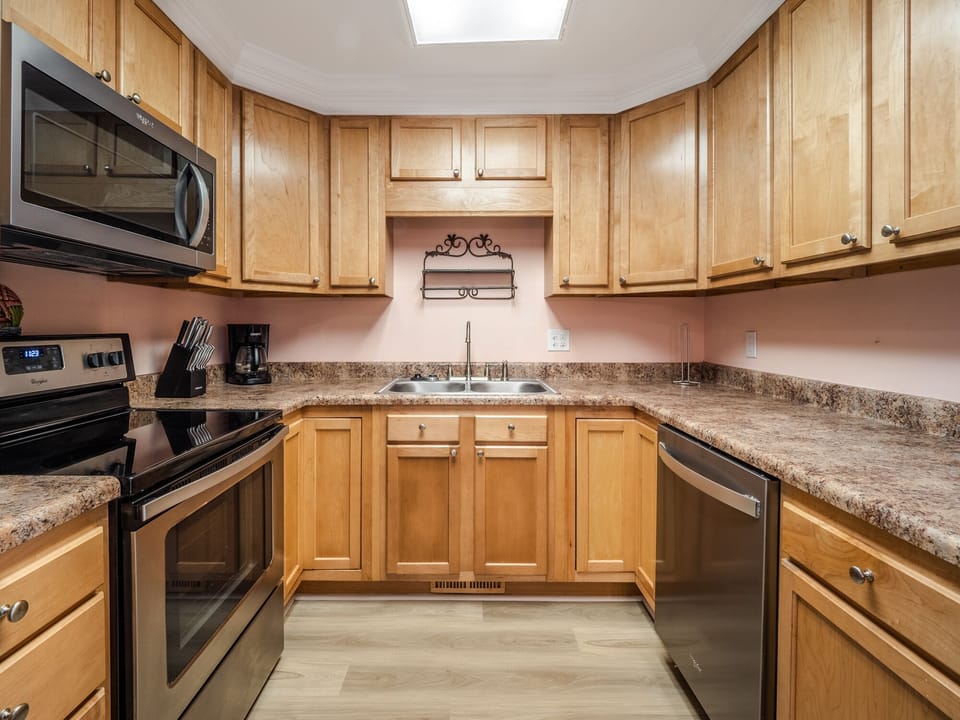 Fully Equipped Kitchen with Stainless Steel Appliances