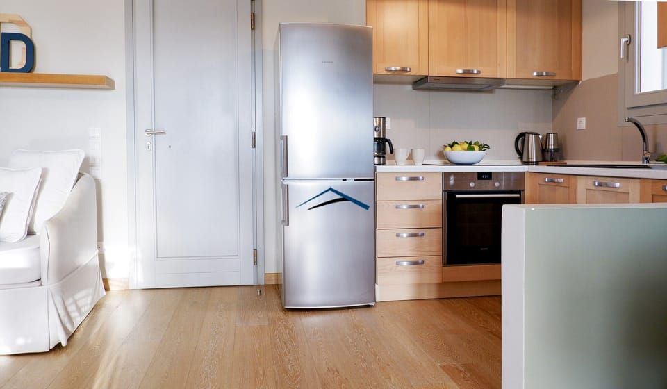 The kitchen next to the living area