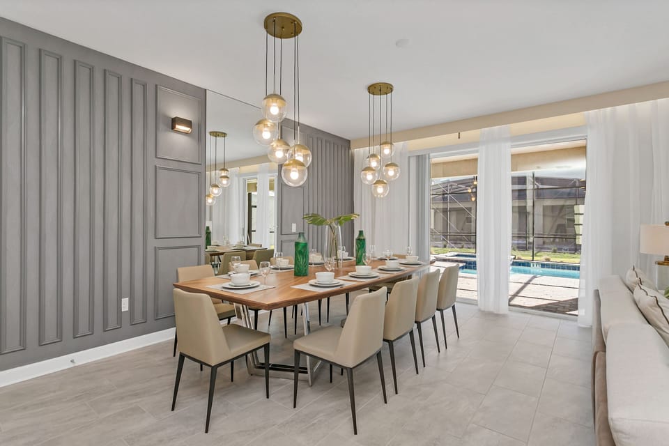 Step into Sophistication: The Dining Area Sets the Scene for an Evening of Elegance, Aglow with Sophisticated Lighting and Ambiance.