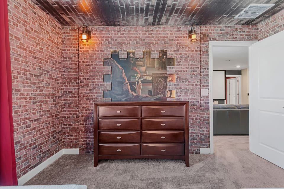 Step into a Realm of Magic and Wonder: Immerse Yourself in the Enchantment of the Wizard-Themed Bedroom, Where Every Detail Speaks of Mystical Adventure and Imagination.