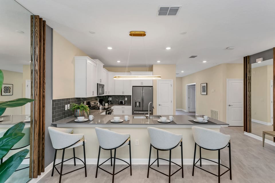 Our Fully Equipped Kitchen Boasts State-of-the-Art Appliances, Ample Counter Space, and Sleek Cabinetry, Making It the Perfect Hub for Culinary Adventures and Gourmet Delights.
