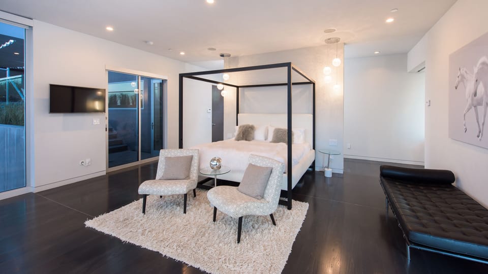 Master bed with king bed and top terrace entrance 